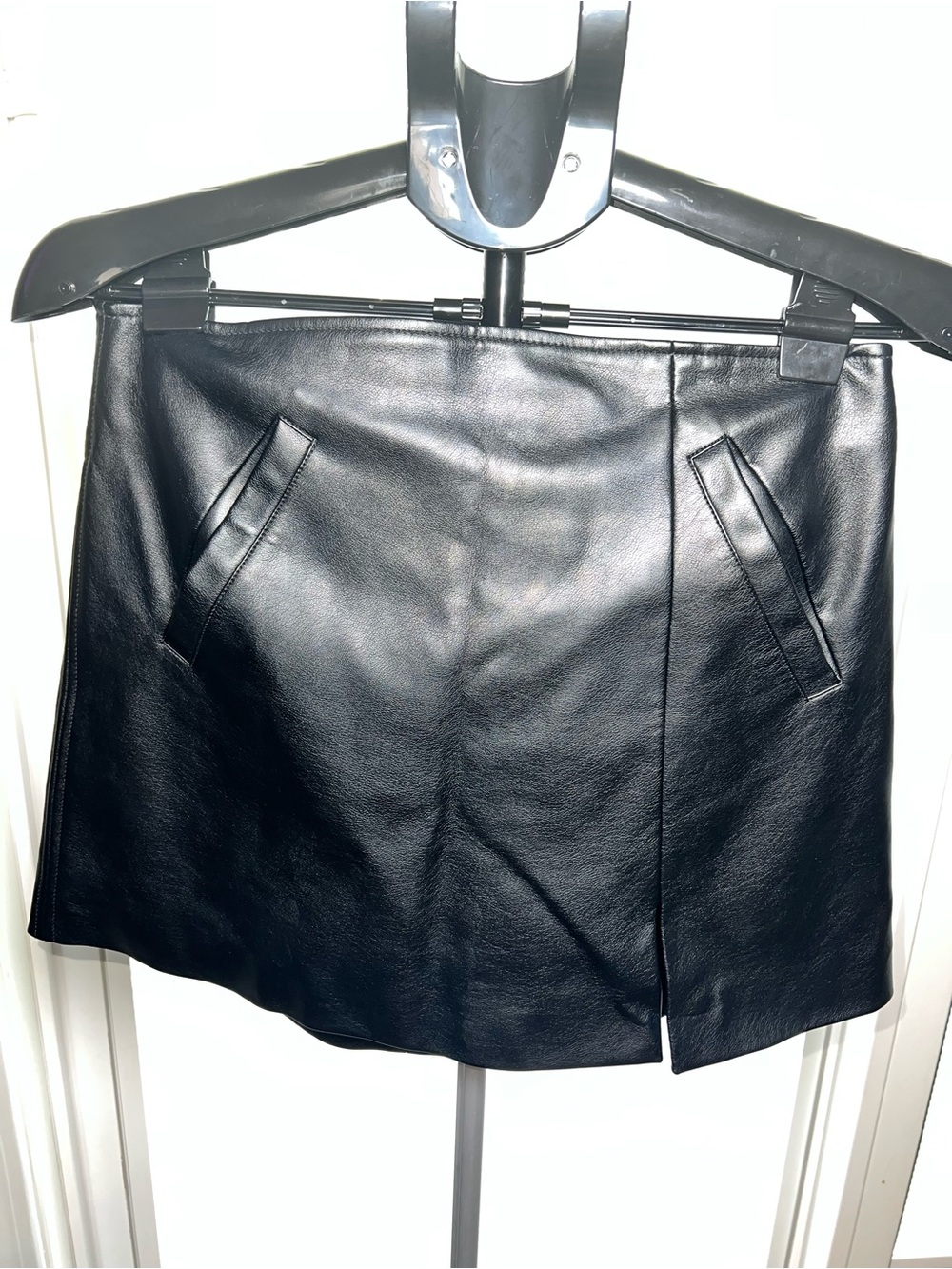 Blank NYC Black Faux Leather Mini Skirt with Subtle Seams